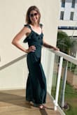 So happy with this. I'm typically a medium, but the size chart put me at a large, which fit perfectly. This isn't listed as tall, but I'm 6'0" and I loved how it fit! Received lots of compliments. Beautiful color. - Lisa S.