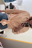 Love this top! It's definitely oversized but that's what I expected! I went with my usual size and was happy with it.  I think it'll be so versatile too- jeans, shorts, coverup. Highly recommend! - Marlaina L.