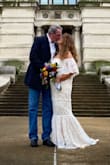 At age 56 I didn't want a big wedding. But wanted a wedding dress that made me feel like a pretty bride. I tried many dresses and am thankful a friend recommended Lulus. Loved this dress as soon as I saw it. Ordered according to the sizing guide and while it did fit, it was super tight on my curvy self. I ordered again one size up (customer service is amazing!) and fit comfortably. Was super long on my 5ft2 self and required shortening. It did show my little belly a bit, but the lace is so pretty and the off shoulder is a style I wear often. I felt beautiful! Highly recommend this dress and Lulus. Thank you for making my day extra special! - Tamara C.