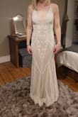 My daughter is getting married in Vegas and wanted a 20' style art deco feel to the dress. I found this online and was a little sceptical but I can honestly say it's every bit as gorgeous as the photos suggest. It's very well made and the quality is amazing for the price. It's not too heavy and it flows beautifully. She is absolutely thrilled with this dress - Yvonne H.
