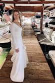 I originally ordered a small, but I sized down because the shoulders and bust were a little too loose. XS fit just about perfect. I am not blessed in the chest so it did fit a little loose. But I was so comfortable all day. The little train and buttons add just a little elegance! I would highly recommend! - Julie N.