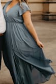 I wore 2.5" heels and it was the perfect length. The dress was flowing enough to be romantic but not out of control in the wind. Perfect amount of cleavage, never once had to adjust that area. Comfortable sleeves and airy material. - Martha T.