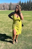 This dress can be dressed up with heels or down with sandals! Very comfortable and flattering in the mid section. I love love love the color it's so bright & perfect spring! - Rachel S.