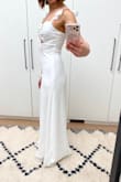 Love the fit and flow. Even my tailor commented on how pretty it was and he never gives compliments! You can see it's a little tight from the photos, but I'm heavier than my normal weight. Needed hemming and the straps needed to be shortened. - Salimah J.