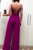 I love the colour. The pants fit great (tight) though. I wish the slits were more apparent (I don't think they'll show much leg). The top feels very slightly off (feels loose in front, but looks like it's tight and pulling at the back) Perhaps because I'm very small chested. I still recommend it. - Salimah J.