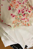 I was disappointed because the picture makes the dress look way more white than it actually is. I didn't pay attention to the ivory color. - Samantha L.