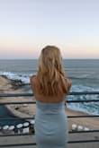 Such a cute, comfortable, and flattering dress! Even for a shorty, I'm 5'0 and didn't have to alter it. I'm almost 2 years postpartum and can't seem to get rid of the belly, but this dress hugs the curves nicely. Love the color too, it matched the ocean at the beach wedding I attended. - Lin J.