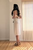 I wanted to love this dress but there were a couple issues I couldn't look past. The material is thinner than I expected and the hem doesn't lie flat. The elastic in the back also causes some bunching that I didn't find flattering. Unfortunately had to return. - Beatriz K.