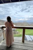 This was a nice dress to wear as a wedding guest. I had to use fashion tape to make the upper part stay on my chest area and I had to get it altered 4" shorter so that it wouldn't be too long with or without heels. My heels were 4". But this dress is lovely. - Kimberly G.