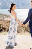 The dress fit me perfectly with no alterations. Since it's a wrap dress, it's very adjustable on the fit. Wore this for my engagement shoot and loved how it looked in the photos! - Kim T.