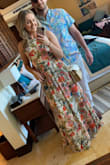 Gorgeous dress, got TONS of compliments on it at a wedding I wore it to. A little long, helped wearing heels but after I took my heels off for dancing, I had to hold the dress up with one hand in order to not trip on it. Fit like a glove, the style is beautiful. - Kirsten I.
