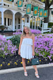 I am so in love with this dress! I bought it for my birthday and I couldn't be happier. It's a little snug around my chest, but that was to be expected. It's the perfect length, not see-through, and just so much fun! I would recommend this to anyone who loves white, strapless dresses. - Kimberly W.