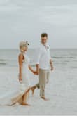 Perfect for our beach wedding! The lace is very soft. I had to hem it in the front and tighten the straps around the neck. - Julie N.