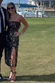 I received so many compliments on this dress. It's made of great quality and fits me perfectly. Order down in size as it runs big around the waist and tighter around the bust area. I didn't have to keep pulling it up all night like I normally do with strapless dresses! - Jamie D.