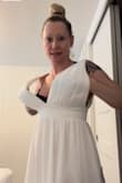 Love the material. But the top is way too big, and it was too long, even with platforms on. I got a small and still have to get it altered. Not happy. - Sara W.