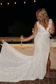 The most perfect wedding dress ever with a little modification.   I didn't love the sleeves so off those went but I did I love not spending a stupid amount on a dress that would end up crumpled on the floor hours later. - Jennifer T.