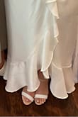 Having a wider foot, and thicker ankle has posed a problem when trying to get cute shoes with an ankle strap. I sized a 1/2 size up from a 7.5 to an 8 and these fit perfect. While it's not like walking on clouds I was able to stay in them for 6 hours before taking them off. Having these to wear for my bridal shower was the perfect shoe! While the photo seems like my toes were squished they weren't at all. - Andrena F.