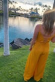 This outfit was fabulous! I wore it to an awards ceremony while on a work trip in Hawaii. It is very flattering and the adjustable back is great since I have a large rib cage. I got so many compliments and would 100% wear it again! The bottoms are a smidge tight but I got them zipped and there were no rolls over the top lol. 10/10 recommend! - Amanda B.