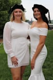 This dress was perfect for graduation. I wore a size medium, and it was true to size and tall girl approved. It is form fitting, so I recommend wearing shape wear underneath. Dress includes a slip underneath and a grip strip along the bra line so it stays in place. - Denise N.
