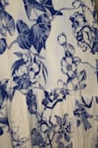 Loved the dress but I washed it on cold delicate cycle and the blue bled into the white. It says not to bleach but I may try that next. It also shrunk a little and I didn't put it in the dryer. - Johanna B.