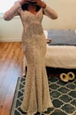 Loved it! It's thick and lined well. Very stretchy and forms to fit snug to your body. I ordered a size Small per reviews and it fit perfectly. It was the right length once I wore 2-3 inch heels, a little long otherwise. Works with a strapless or sticky bra. - Marie C.