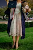 This dress is so elegant and lovely. I wore this with on my graduation and it's the perfect midi length for someone who wants to dress more modest. It's comfortable and has a beautiful flow. - Abera G.