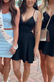 I needed a black dress for my BFFs bachelorette party, but I was 11 weeks pregnant at the time and had a little lower belly pooch that I wanted to be hidden. I chose this dress since it is a skater style and the skirt flared out just enough to hide the pooch. The back of the dress is very pretty, wish I would've gotten pics of it. Overall, it was comfortable and cute, I just wish it was a tad shorter (I am also short though with short legs, so if you have longer legs it would probably be a better length for you). - Kaitlyn P.