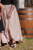 Very see-through, and feels very cheap for the price. It feels similar to a bedsheet and wrinkles very easily. The color is okay and it worked for the wedding but still disappointed. - Madison M.