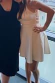 This dress is very flattering and high quality. - Carlee K.