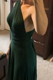 I bought this dress in a size small. The material is extremely soft but thick. Great quality for the price. The dress is a few inches too long for me but easy fix by wearing heels or adjusting the dress up in the waist. - Brigitte S.