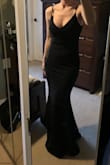 Great quality, thick, stretchy material. This dress runs a bit long for me even in 4-inch heels so will need to have it hemmed. - Brigitte S.