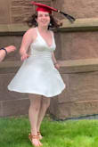Wore this for my graduation and loved it - the open back was really cute, and the neckline was incredibly flattering. I have small shoulders so I had to get the straps slightly altered, but once I did, it fit perfectly. - Joanna G.