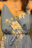 I sized down according to the reviews and the XS fits perfectly. I am usually in between a size small and a medium and while the small would work, the XS looked better. It is a little long but if you pair it with a heeled shoe it looks fine. 

One thing I noticed was a lack of quality control in the top of these dresses. I ordered this dress in the orange color as well and returned it because the flower pattern was barely present- it almost looks like they sewed the top of the dress inside out. This was also the case with the blue Small, but the dress I kept, the blue XSmall, had the pattern on the top and I love it. I have attached photos of both here. - Kristin C.