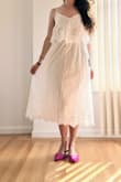 I was looking for a simple white dress for spring and summertime and this is it! It has an elastic waist so it can stretch and cinch you in. It's light and airy and I love the embroidery details! Like many white dresses it's a tad sheer so wear nude undergarments! - Beatriz K.