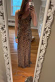 I bought this for a college formal and got SO many compliments. I'm not normally into leopard print but this looks so adorable on. It is longer on me than I would've expected so I'd recommend wearing it with higher heels or getting it hemmed. I wore an adhesive bra with it which worked great. - Emily O.
