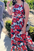 The dress is beautiful and I got a lot of compliments on this dress. Like other reviews, the skirt was really long and big around my abdomen but fit at my hips. I had to take in the waist and wear heels to make sure I wasn't dragging the skirt. - Dalila L.