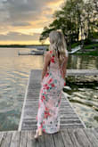 Beautiful dress but a little long even with heels on. The top is a little loose and would stay put better if you had a larger bust as the straps aren't adjustable. Overall, received many compliments on this dress! - Grace H.