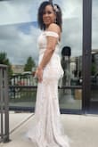 Wore this to my wedding this weekend.. beautiful and well-made dress. So in love with it.. the detail is everything. I gave 4 stars because there is very little hip space and it does make u look a lil boxy...I added a belt that gave the illusion of a smaller waist - Naomi S.