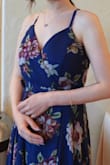 I wore this dress to my sister's wedding and it was perfect. I'm 47kg with a large bust so I was a little worried it wouldn't fit right. Also, I live out of the country and had it delivered to the States so I took a risk. I had to get it hemmed but other than that, it was beautiful. I wore a strapless bra and the button of the dress didn't pop open. - Rebecca H.