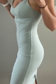 So in love. Fits perfectly. Super comfortable, and there is room for some stretch. Don't need to wear a bra because it is tight enough (also I wear both 36C and 34D). Sophisticated and sexy style. Wonderful choice for a curvier gal. All my measurements are correct. I got a small and plan to wear it to a wedding this summer. Definitely getting it in another color to wear to the many other weddings I have this season! - Rachel G.