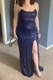 I didn't want to take this dress off because it makes me feel so beautiful! It accommodates my curves well and doesn't make me feel like I'm playing dress-up in spite of the sparkles. I'm short, so it does pool a bit on the floor when I wear it. - Katie B.