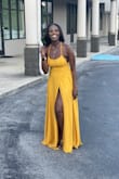 I am in love with this dress! I am pretty busty and have long legs so I was sketchy regarding fit and length. I ordered a medium and got a great fit. The material is really nice and the length is long so you basically float into the room. I did have a little side boob action which would be reduced once I adjusted the straps. The color is exactly the way it's pictured, it looks amazing on my skin. I purchased the yellow and later purchased the green as well. I am now a loyal customer of this brand! - Chanice S.