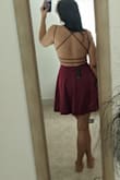 I loved the back it had good support but the flair of the bottom made my hips look wider than they are. I think a smaller size may have fit better - Meenakshi S.