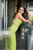 It fit really well and it was more flattering on the belly than I thought! I recommend wearing it with no spandex or even underwear to avoid visible lines but it looks wonderful!! I dressed it up with some fun heels but I can easily wear it with white tennis shoes. - Monica H.