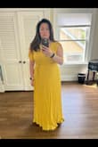 Love this dress!!! Great for us bigger chested girls without accentuating them. Felt so comfortable in it and would highly recommend! Only thing is that I think I should've gotten a size smaller as the line for my shoulders were a little too wide so it felt like my bra straps were falling down when it was just the shoulder seam. - Lisa P.
