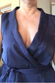 Very much a gaping top. I'm not very busty, and I do not have a long torso& so maybe not the best fit for me personally-as I'm short, 5'3. It was also difficult to get out of.  Just not the best fit for me. Nice, soft silky feel material & not sheer. Returned and Lulus is always timely and fast and easy to take care of returns. And I do like the reviews as they do help shop online. - Lisa F.