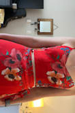 I read the reviews and bought a small unsure of which size because people said due to it being tied you can customize the size. This is not really the case because it ties on both sides, once under and once over so if the under one is too big, the skirt falls down. Also the top was so loose that I couldn't tie the corset tight enough. Below is a photo of the Small which was too big and then the XS which fit correctly. Also I am 5'2 and wore 3" heels and it was just the correct length, so if you're planning on flat shoes you'll need a hem unless you're taller. - Lexi B.