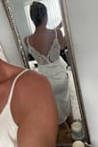 This dress is amazing. I bought this to change into the night of my wedding when we go out after the ceremony so my wedding dress doesn't get dirty at the bars. I'm always skeptical when I read that a dress is a satin but also stretchy. This dress feels and is high-quality material. It stretches and fits your curves perfectly! - Amelia B.