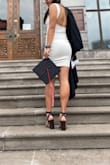 It definitely scrunches up and fits shorter than the pictures, but I kind of love it like that. It is also double lined and the inner lining wasn't exactly equal, but when you put it on and tuck it in it's fine. - Stella T.