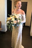 I loved my dress! It was a little big so I did get it altered. Was wonderful for the day of. - Kelsey G.